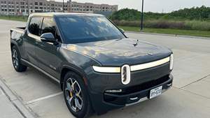 LISTO PARA ENVIAR - USADO, VOLANTE A LA IZQUIERDA |   CONDUCCIÓN DERECHA |   RIVIAN R1T ADVENTURE EDITION 2023, 4700 millas, motor cuádruple, tracción total - Product Image 2