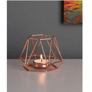 Bougie chauffe-plat en métal au design unique, parfaite pour les décorations de maison et de mariage, disponible au meilleur prix d'Inde - Product Image 1