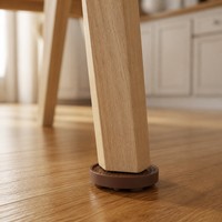 Patins de protection antidérapants en silicone alvéolé pour pieds de meubles, chaises et tables, anti-rayures et anti-vibrations, fabriqués en Chine, emballés pour l'expédition.