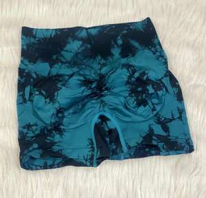 Pantalones cortos sin costuras de entrenamiento de gimnasio personalizados para mujer, pantalones deportivos de patrón sólido de cintura alta elástica, tallas personalizadas de nailon y LICRA - Product Image 2