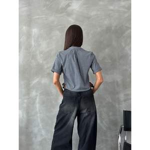 เสื้อเชิ้ตและเสื้อเบลาส์ลายทางสำหรับผู้หญิง Topshow สีดำ พร้อมเข็มขัด ขายส่ง - Product Image 1