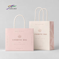 Sac shopping en papier de luxe personnalisé avec poignée en corde, impression de logo pour l'emballage de vêtements de mode en détail
