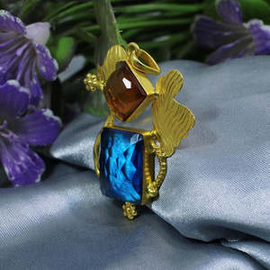 Vente en gros de pendentifs faits main en citrine et tanzanite avec breloque religieuse en or rose, longueur 57mm, poids 10.96g - Product Image 4