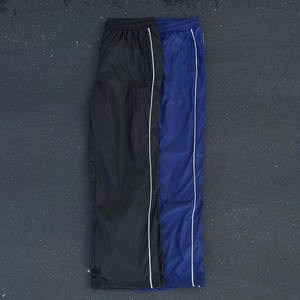 Pantalon de sport pour homme en polyester et nylon, personnalisé, décontracté, ample, pour la course à pied en plein air, séchage rapide, imperméable, avec bande latérale - Product Image 2