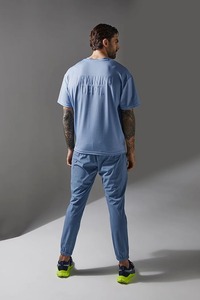 เสื้อยืดสวมหัวพิมพ์ลาย DTG สำหรับผู้ชายโอเวอร์ไซส์ไหล่ตกทรงหลวมแขนสั้นพอดีตัวทำจากผ้าฝ้ายเจอร์ซี่โลโก้ที่กำหนดเอง - Product Image 3