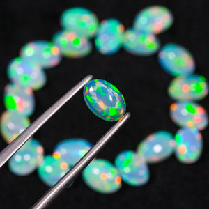 อัญมณีโอปอลคาร์โบชองแท้สีรุ้งสีขาวไฟสีขาวแบบโอปอลทรงหลังเบี้ยทรงหลวมธรรมชาติอัญมณีโอปอลไฟสีขาว - Product Image 4