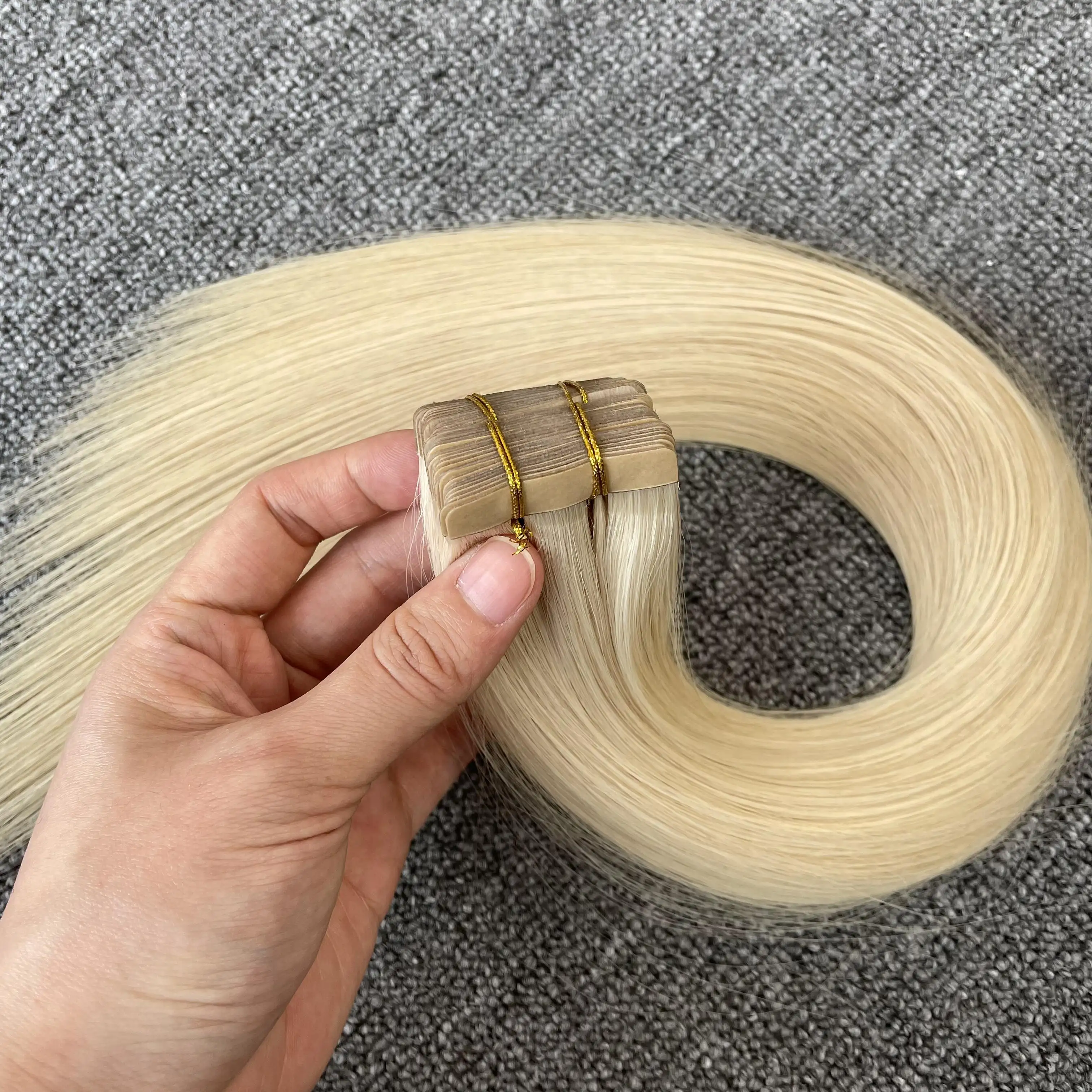 ベストセラーの二重描画ロシア人毛テープヘアエクステンション高品質ナチュラルローテープヘアエクステンション