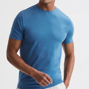 Nueva Camiseta holgada básica de algodón de Color puro para hombre, Camiseta con cuello redondo, logotipo personalizado, camisetas de algodón 100% transpirables de manga corta - Product Image 1