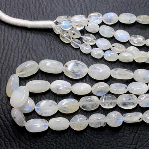 Piedras lunares arcoíris blancas Cuentas de piedra de Fuego Azul natural ovaladas lisas Tamaños 6X9MM y 16X10MM Aprox. 15 pulgadas - Product Image 1