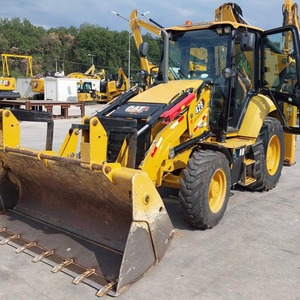 Chargeur de tracteur Caterpillar 428 avec capacité de levage lourde de conception compacte et système de transmission fiable - Product Image 2