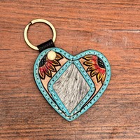 Nouveaux cheveux occidentaux sur cuir usiné à la main en forme de coeur porte-clés en cuir véritable sculpté porte-clés Turquoise tournesol porte-clés de luxe