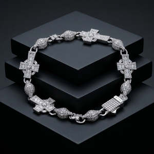 Bracelet élégant en or blanc avec croix sacrée pavée de diamants, serti de pierres rondes et baguettes, fermoir boîte, bijou de déclaration - Product Image 1