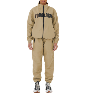 Chándal de poliéster con logotipo personalizado para mujer, conjunto de 2 piezas, chaqueta cortavientos, pantalones para correr, ropa deportiva ligera, traje de entrenamiento de nailon - Product Image 1