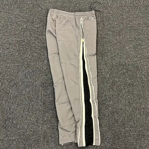 กางเกงวินด์เบรกเกอร์ทรงหลวมแบบยูนิเซ็กซ์  ผ้าไนลอน แห้งเร็ว  ทรงปกติ  มีซิป  หลายขนาด  ใส่ได้ทั้งชายและหญิง - Product Image 3