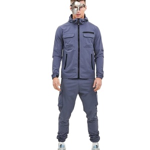Survêtement Coupe-Vent Survêtement en Nylon Imprimé Jogger Deux Pièces Jogging Pantalon de Survêtement et Veste pour Homme - Product Image 1