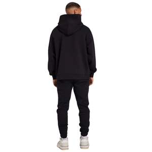 Pantalones de chándal colectivos negros para hombre, ajuste relajado, forro polar de algodón suave, cintura elástica, uso diario acogedor, detalle de logotipo Premium - Product Image 6