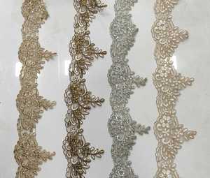 custom made machine embroidered laces in floral designs and in six colours with embroidery material attached for wedding dress - Product Image 3