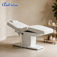 Lit de beauté facial moderne en PVC avec mécanisme de levage électrique, 3 moteurs, design pliable pour usage en salon