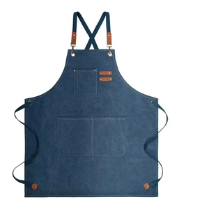 Delantal Clásico de Lona sin Mangas con Detalles en Cuero, Resistente, con Múltiples Bolsillos para Uso Diario - Product Image 1