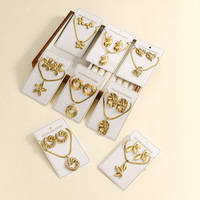 Ensemble collier et boucles d'oreilles pour femmes en acier inoxydable plaqué or, pendentif ovale, fleur, papillon, irrégulier, circulaire, pour cadeaux