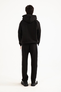 Streetwear Sweat à capuche zippé noir en coton mélangé baggy avec manches en blocs de couleurs - Product Image 4