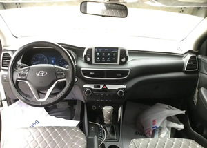 2021 pour Hyundai Tucson SUV I4 d'occasion prêt à conduire sans accident faible kilométrage intérieur en cuir foncé boîte de vitesses automatique AWD gauche - Product Image 4