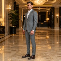 Costume homme gris moyen, simple boutonnage, deux boutons, revers cranté, poches à rabat, boutons en corne, costumes d'affaires pour homme, sur mesure MTM