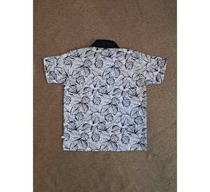 T-shirt en tissu de coton biologique doux pour garçons T-shirt élégant et à la mode imprimé feuilles tropicales avec poche avant et col - Product Image 1