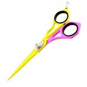 กรรไกรตัดผมสีเหลืองนีออนและชมพูแบบมืออาชีพ พร้อมใบมีดตรงคมกริบและด้ามจับทรงเรขาคณิตตามหลักสรีรศาสตร์ - Product Image 1