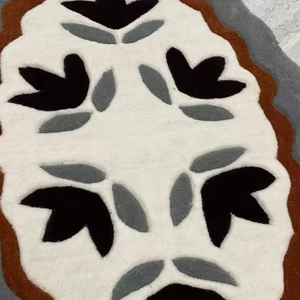 ผ้าไหมขนสัตว์แฮนด์เมดทรงรีแบบทอมือสีดำและรูปแบบนามธรรมของ ewhit สำหรับห้องนั่งเล่นบ้าน - Product Image 1