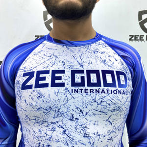 Vêtements de protection anti-éruptions cutanées à manches longues respirants et extensibles avec logo à sublimation personnalisée pour les arts martiaux de Muay Thai Jiu Jitsu Kimono - Product Image 1