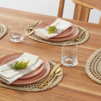 Assiettes de chargeur tissées napperons en raphia réutilisables en gros napperon ovale en jonc de mer durable naturel de l'usine du Vietnam