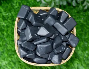 High quality natural black shungite hand polished tumbled stones for electricity for healing therapy or home or table decoration