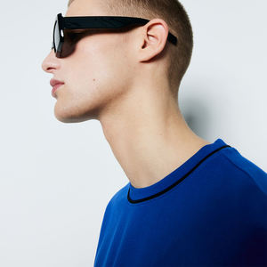 Vente en gros de vêtements d'été pour enfants de haute qualité T-shirt à manches courtes 100% coton Streetwear tricoté respirant avec logo personnalisé - Product Image 6