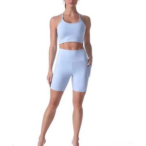 ชุดออกกำลังกาย2ชิ้นสำหรับผู้หญิง,ชุดเสื้อในยิมกางเกงขาสั้นผ้าสแปนเด็กซ์โพลีเอสเตอร์สีพื้นสั้นสำหรับนักขี่จักรยาน - Product Image 1