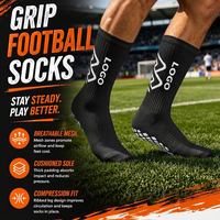 Chaussettes de football personnalisées à forte valeur ajoutée Chaussettes à prise en main d'usine Chaussettes antidérapantes