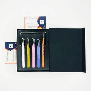 Pinzas para Pestañas con Puntas de Fibra Dentadas de Somofy Enterprises, 10 mm de Longitud, Agarre Perfecto, Duraderas para Extensión de Pestañas, Acero Inoxidable - Product Image 1