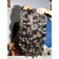 Rambut manusia bergelombang India mentah pakan 100% rambut Remy Virgin yang tidak diproses, hitam alami, bebas kusut & bebas penumpahan