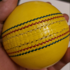 SUMROOS Leather Cricket <b>Ball</b> Indoor Yellow Color Hard And Seasoned Hand Stitched & Leather Cricket <b>Ball</b> Indoor Yellow Color - Product Image 1