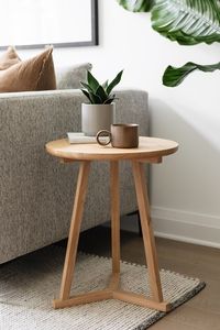 Elegant round wood <b>side</b> <b>table</b> with fluted base and smooth top designed for sophisticated home or office interiors - Product Image 4