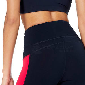 Venta al por mayor de pantalones de yoga con cintura alta y control de barriga para las mallas a prueba de sentadillas cintura elástica patrón sólido mallas de yoga - Product Image 5