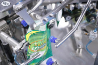 Machine d'emballage rotative multifonctionnelle pour sachets de pâte, ketchup, sauce, machine de remplissage de sachets préformés, machine de remplissage de liquides