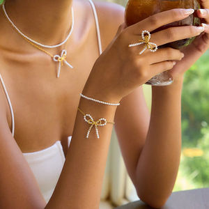 J & D Модный Роскошный 18K позолоченный жемчужный бант двухслойный набор из нержавеющей стали с текстурированным кольцом для женщин - Product Image 2