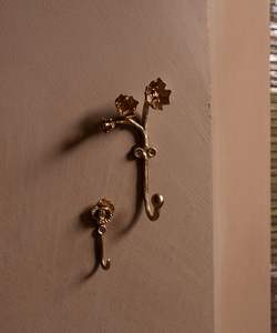 Heavy duty brass wall hooks ideal for commercial residential spaces ensuring long lasting performance and stability strength - Product Image 1