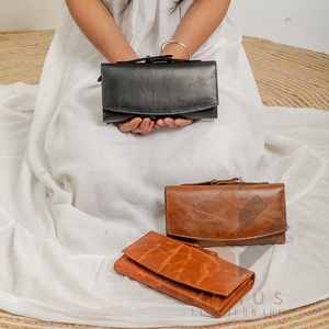 100% กระเป๋าคลัทช์หนังแท้สีดำกระเป๋าสตางค์สำหรับผู้หญิงสวยจับป้องกันการโจรกรรมมีซิปปิดสีดำ - Product Image 1