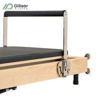 Reformer Pilates pliable en érable avec mécanisme de pliage rapide et machine de Pilates Reformer