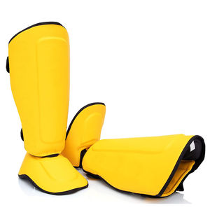 Espinilleras Juveniles Ligeras de Cuero para Muay Thai, Boxeo, Kickboxing, Karate, MMA, con Logotipo Personalizado - Product Image 1