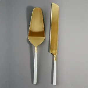 Ensemble de serveur à gâteau, spatule et couteau à dessert en acier inoxydable doré, avec manche blanc, pour les restaurants et les fournisseurs de vaisselle - Product Image 1