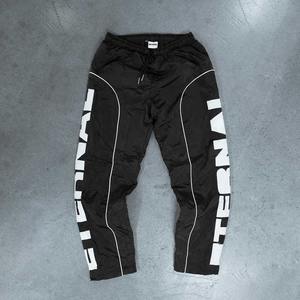 Joggers personalizados, pantalones acampanados vintage, pantalones deportivos para correr, pantalones de chándal con estampado de gran tamaño holgado, pantalones cortavientos reflectantes para hombres - Product Image 2