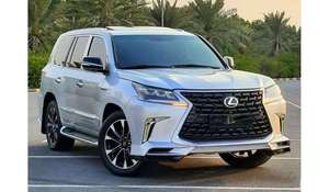 รถกระบะมือสอง LX 570 ปี 2023-2024 ขับเคลื่อนสี่ล้อ เบาะหนัง ล้อแม็ก R17 ระบบควบคุมความเร็วอัตโนมัติ พวงมาลัยขวา หลังคาซันรูฟแบบพาโนรามา เกียร์อัตโนมัติ ภายในสีเข้ม - Product Image 5